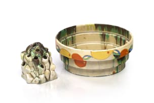 Clarice Cliff; A Clarice Cliff 'Delecia Bizzare' bowl and flower frog