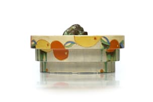 Clarice Cliff; A Clarice Cliff 'Delecia Bizzare' bowl and flower frog