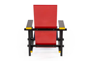 Gerrit Rietveld; 'Red and Blue' armchair after a 1918 design by Gerrit Rietveld,