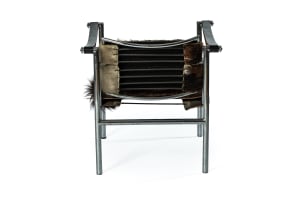Le Corbusier, Pierre Jeanneret & Charlotte Perriand; Pair of 'LC1' cowhide, leather and chrome armchairs after a 1928 design by Le Corbusier, Pierre Jeannert and Charlotte Periand, Italy