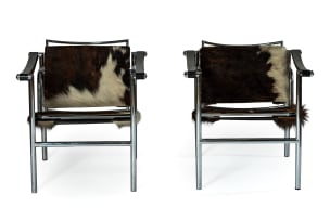 Le Corbusier, Pierre Jeanneret & Charlotte Perriand; Pair of 'LC1' cowhide, leather and chrome armchairs after a 1928 design by Le Corbusier, Pierre Jeannert and Charlotte Periand, Italy