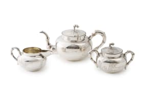 A Chinese silver export three-piece tea service, Hong Kong, late 19th century
