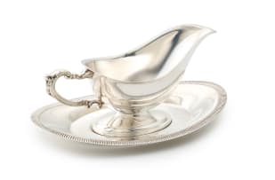 An electroplated silver sauceboat-on-stand, 20th century