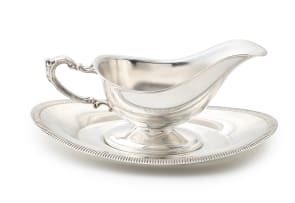 An electroplated silver sauceboat-on-stand, 20th century