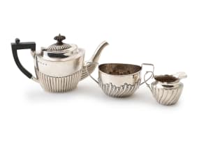 An assembled Victorian silver three-piece tea service, John Millward Banks, Birmingham, 1896
