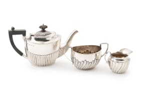 An assembled Victorian silver three-piece tea service, John Millward Banks, Birmingham, 1896