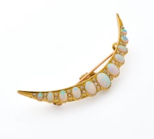 Opal crescent brooch