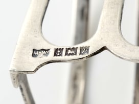 An Elizabeth II silver toast rack, Mappin and Webb, Birmingham, 1964