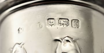 A pair of Edward VII silver salt and pepper pots, M & C Lister Ltd, Birmingham, 1906