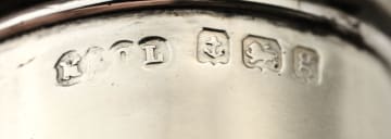 A pair of Edward VII silver salt and pepper pots, M & C Lister Ltd, Birmingham, 1906