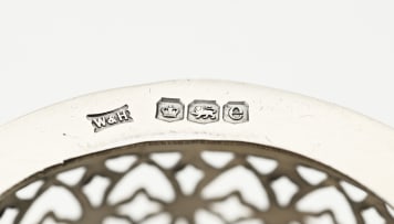 A pair of George V silver glass holders, Walker & Hall, Sheffield, 1922