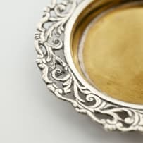 Six silver-plated coasters, late 19th/early 20th century