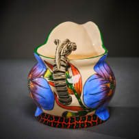 Ardmore Ceramic Studio; Zebra milk jug with blue flowers