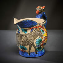 Ardmore Ceramic Studio; Zebra milk jug with yellow flowers