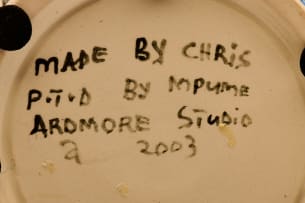 Ardmore Ceramic Studio; Zebra milk jug with yellow flowers