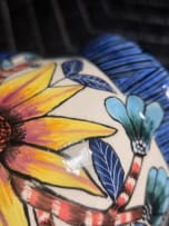 Ardmore Ceramic Studio; Zebra milk jug with yellow flowers