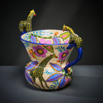Ardmore Ceramic Studio; Giraffe and flower vase with handles