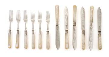 A set of twelve Edward VII silver and mother-of-pearl fish knives and forks, Walker & Hall, Sheffield, 1902