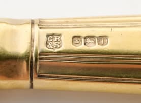 Sixteen Elizabeth II silver-gilt King's pattern knives, Cooper Brothers & Sons Ltd, 1970
