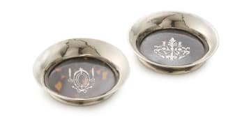 A near pair of George V silver-mounted and tortoiseshell coasters, C&A maker's mark, London, 1919
