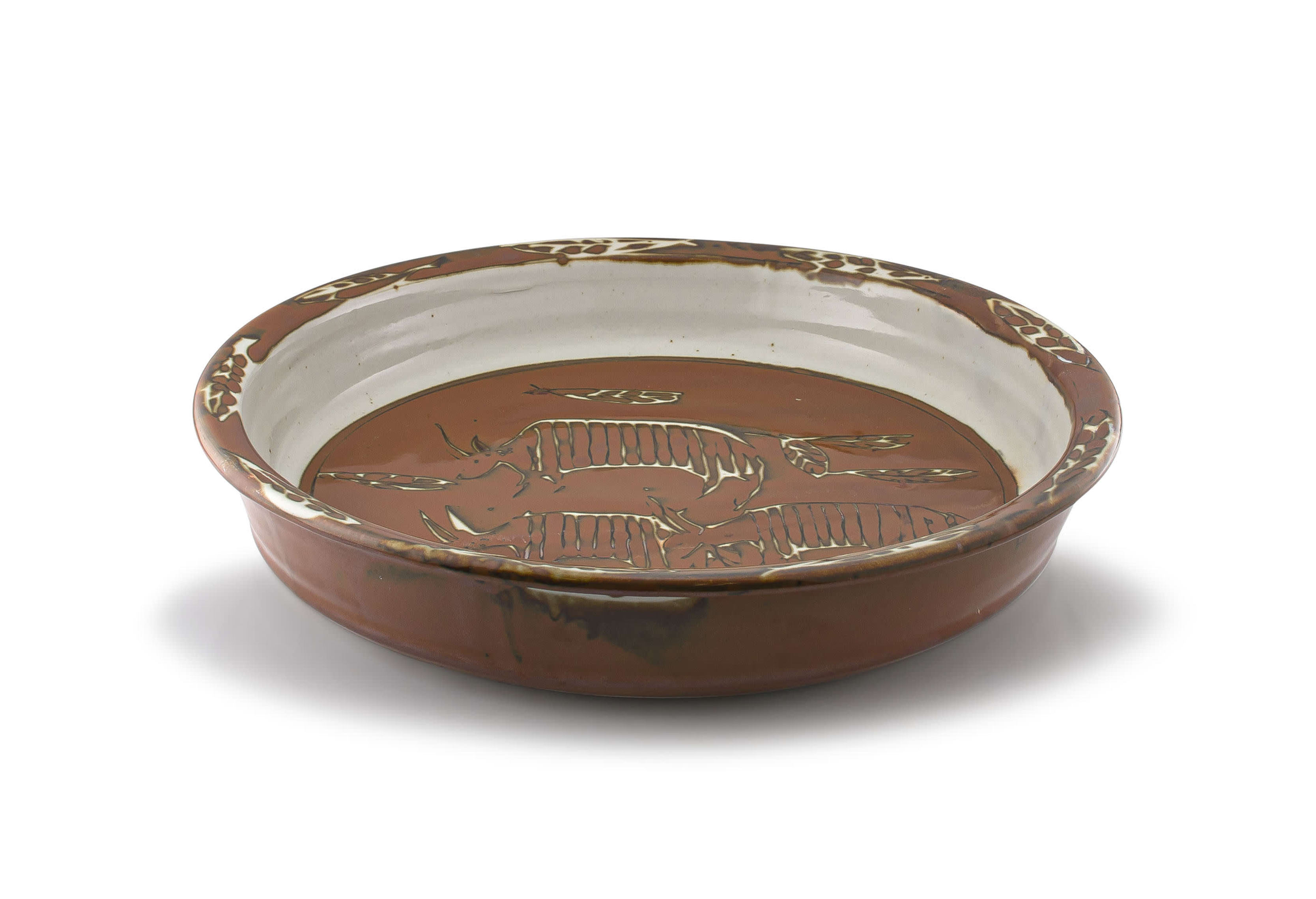 A large South African stoneware dish Strauss & Co