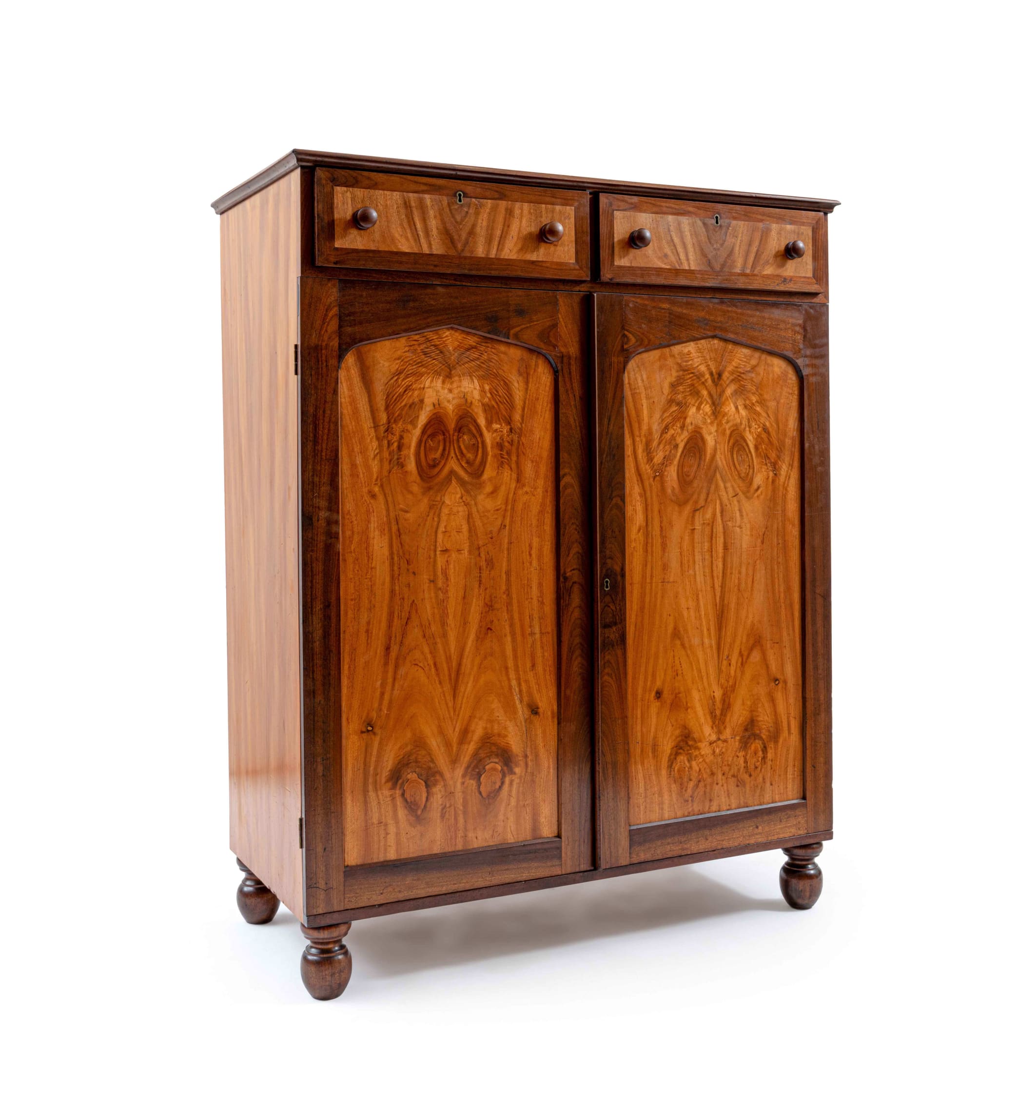 A Cape camphorwood and stinkwood jonkmanskas, 19th century | Strauss & Co